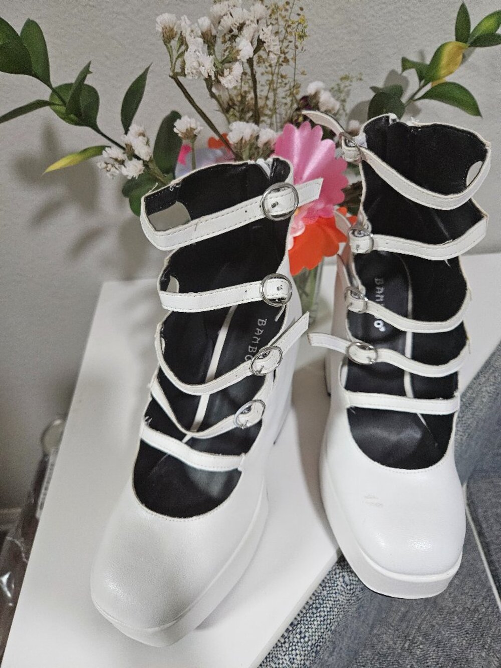Anime style white straps. Platforms